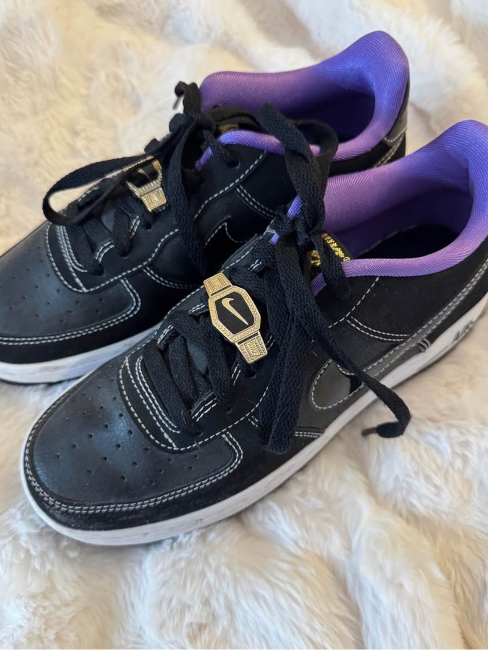 Nike Women’s Black Sneakers with Purple Interior